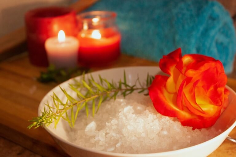 A serene home spa setup with candles, essential oils, and soft towels, creating a calming atmosphere.