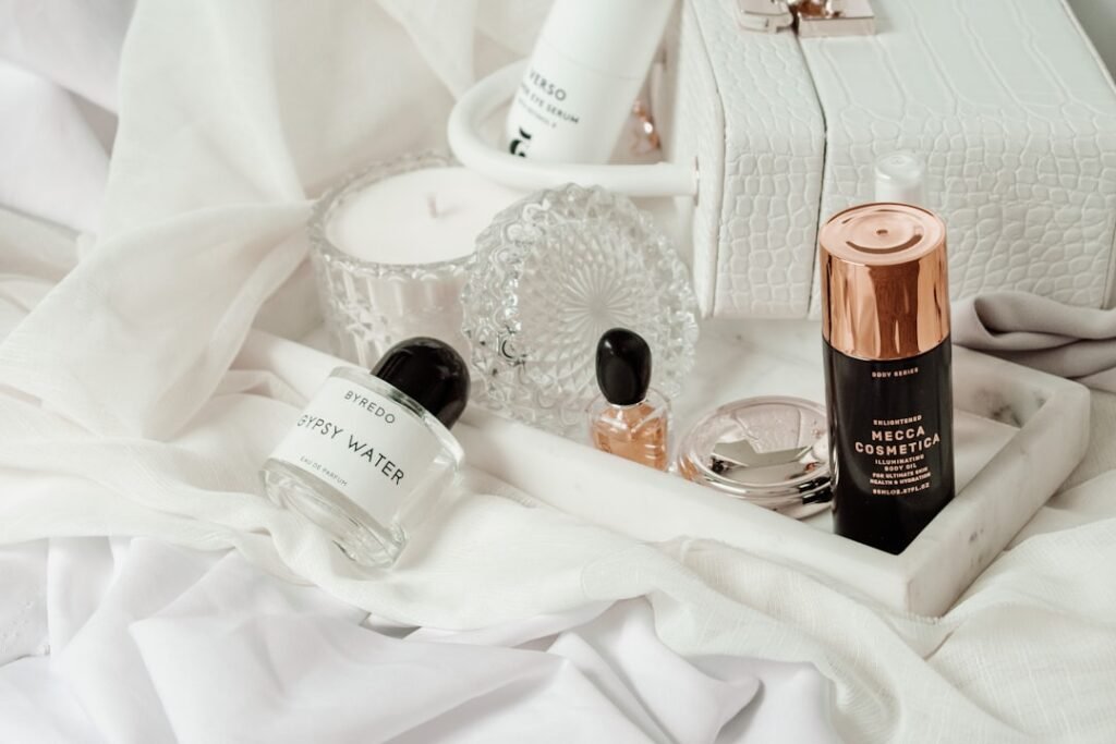 A collection of affordable skincare products arranged on a bathroom counter, including cleansers, moisturizers, and serums, with a soft natural light illuminating the scene.