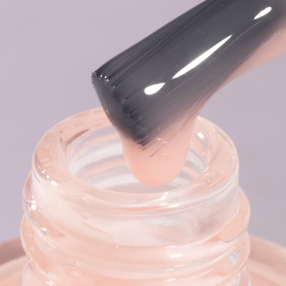 Tinovo Uno Pink Nail Strengthener bottle on white background – view 3