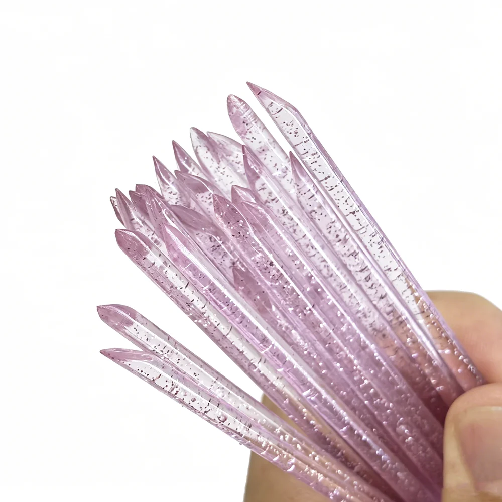 Disposable double-ended cuticle pusher and cleaning stick on a white background – view 2