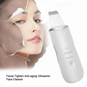 Ultrasonic skin scrubber with shovel spatula tip on neutral background